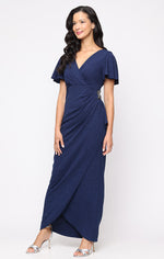 Long Empire Waist Dress with Surplice Neckline, Flutter Sleeves, Embellishment Detail at Hip and Cascade Skirt