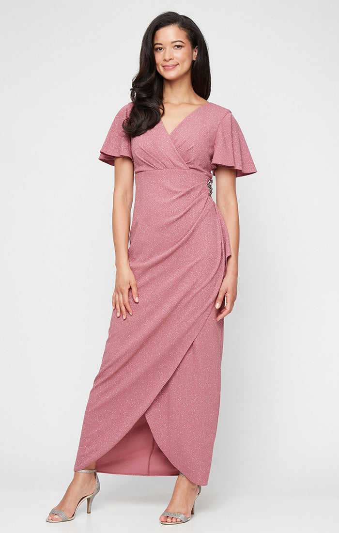 Empire Waist Metallic Knit Dress with Surplice Neckline, Flutter Sleeves, Embellishment Detail at Hip and Cascade Skirt Empire Waist Metallic Knit Dress with Surplice Neckline, Flutter Sleeves, Embellishment Detail at Hip and Cascade Skirt