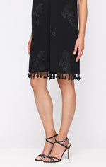 Short Sleeveless Shift Dress with V-Neckline and Fringe Hem Detail