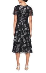 Tea Length Printed Shimmer Surplice Neckline Dress with Ruched Waist, Flutter Sleeves and Tiered Skirt