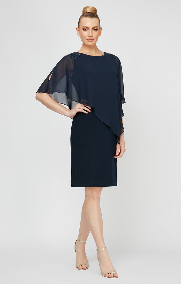 S.L. Fashions Women's Attached Cape Beaded Tier Dress (Petite and Regu S.L. Fashions Women\u0027s Long Shimmer Foil Printed Chiffon Overlay