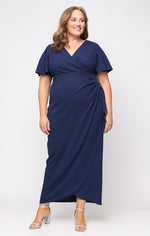 Plus Long Empire Waist Dress with Surplice Neckline, Flutter Sleeves, Embellishment Detail at Hip and Cascade Skirt